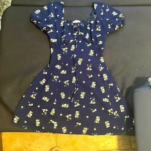 A purple snow medium dress. With flowers on it.